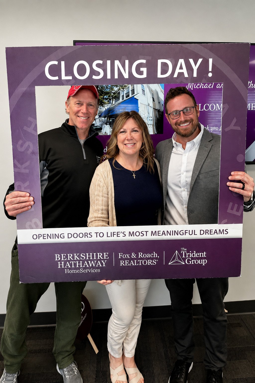 Matt Giroud celebrating closing day with two clients.