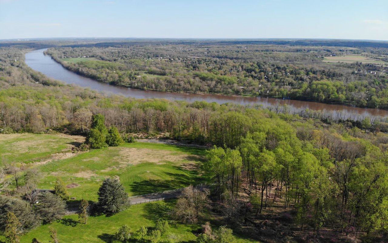 Aerial view of wooded areas, open land and waterways in Upper Township, New Jersey.